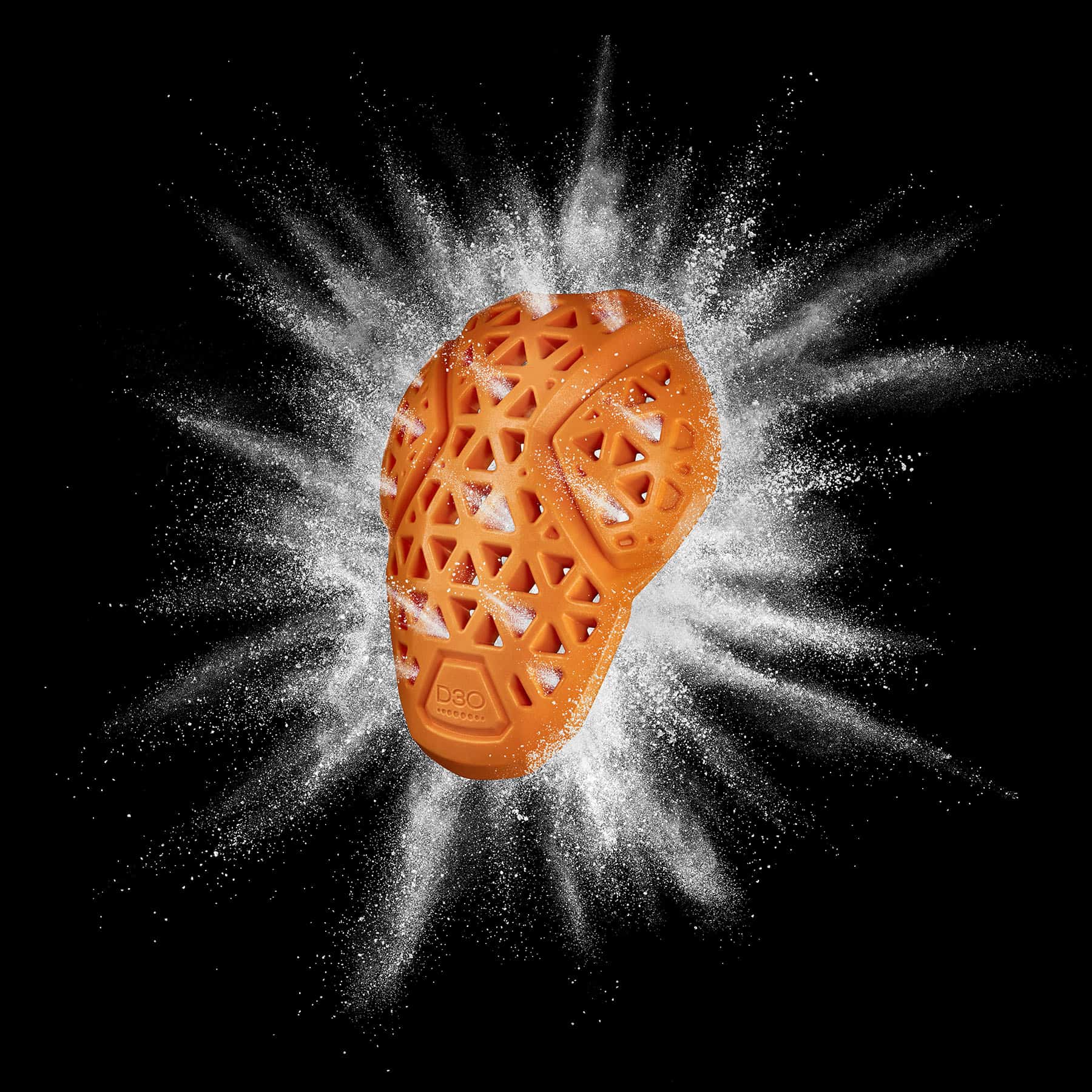 Black background image showing orange D3O shoulder armour and breathability