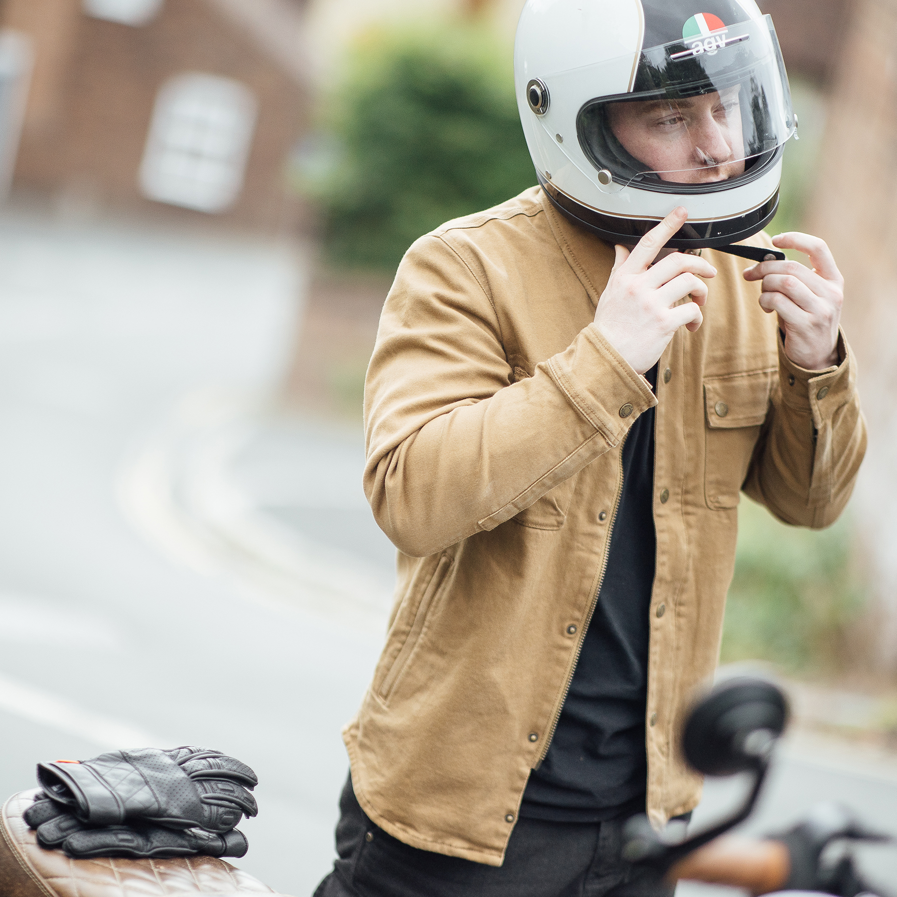 Lifestyle image of the Merlin Brody shirt in colour camel