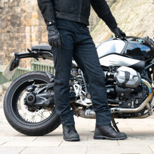 Lifestyle image of Merlin Dunford riding jeans in blue