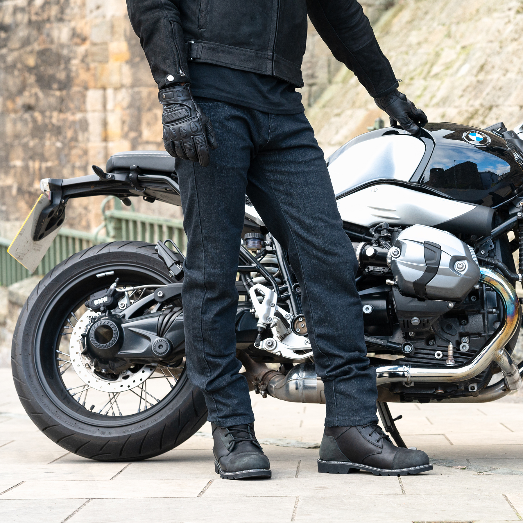 Lifestyle image of Merlin Dunford riding jeans in blue