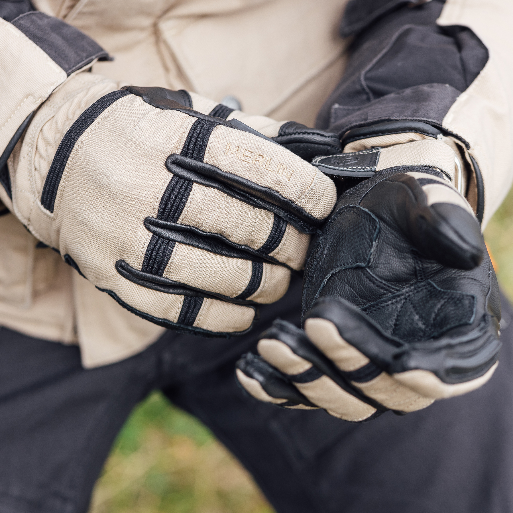 Lifestyle image of the Mahala Waterproof Glove in sand