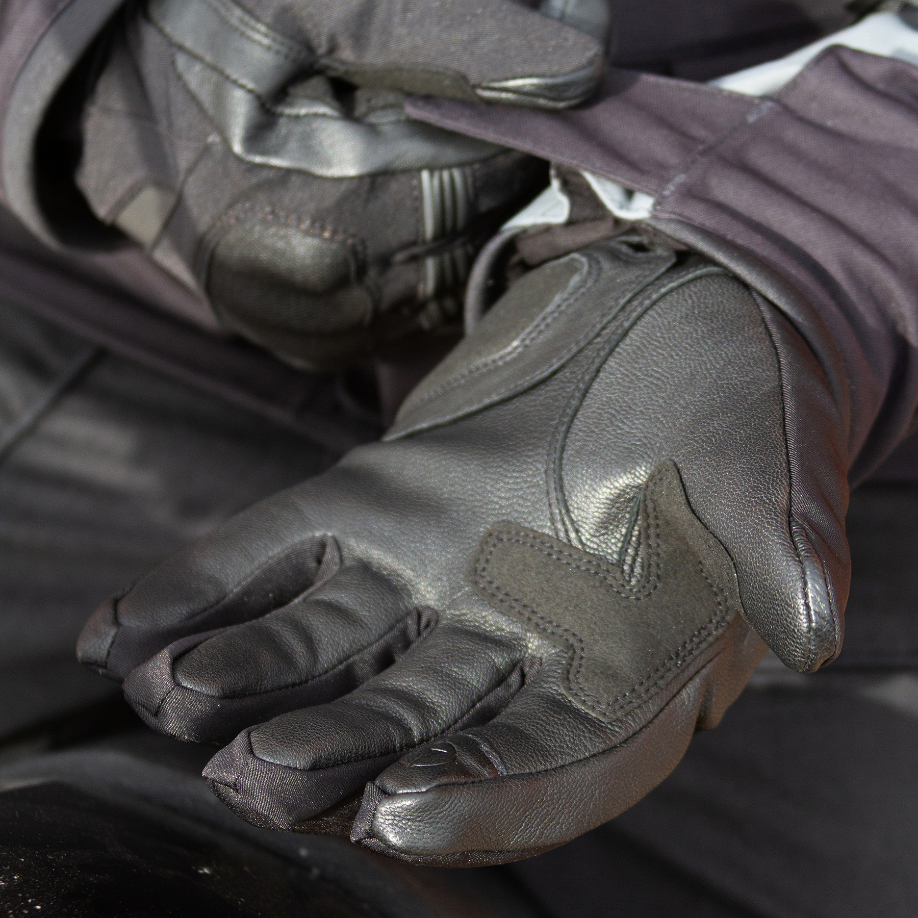 Lifestyle image of the Merlin Summit Heated Glove