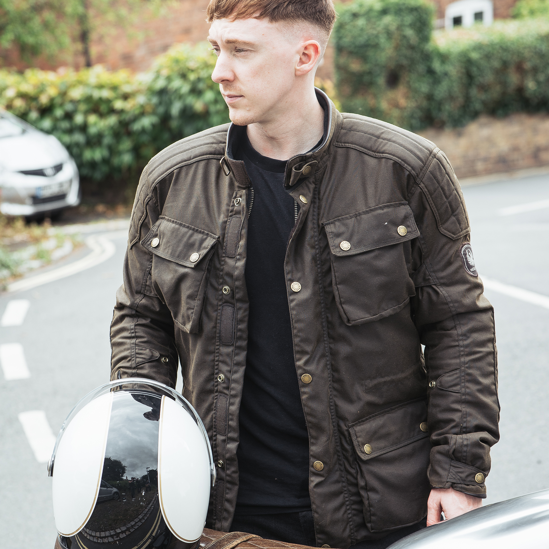 Lifestyle image of the Merlin Tewkesbury jacket in olive