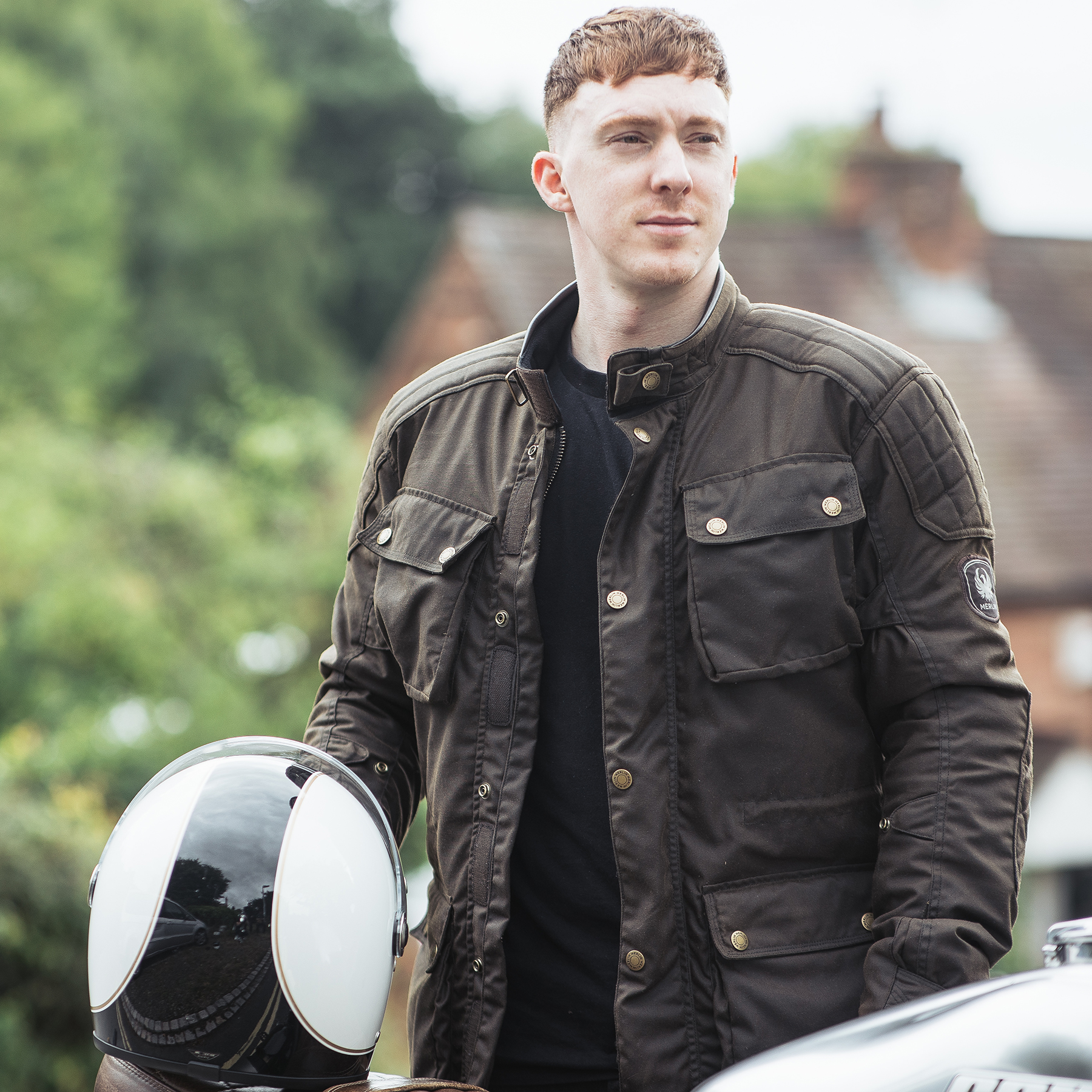 Lifestyle image of the Merlin Tewkesbury jacket in olive